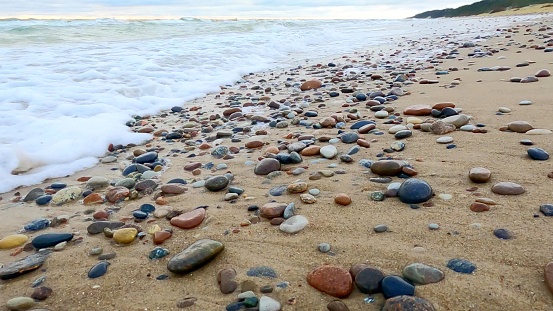 Photo of colored pebbles on a beach