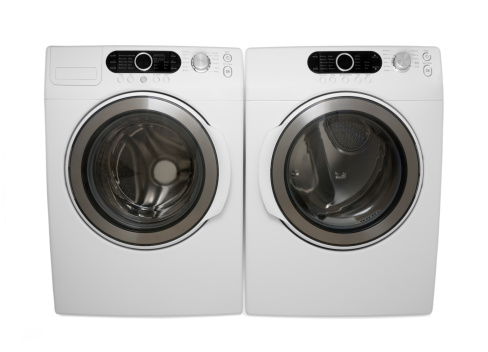 Frontload washer and dryer isolated on a white background.