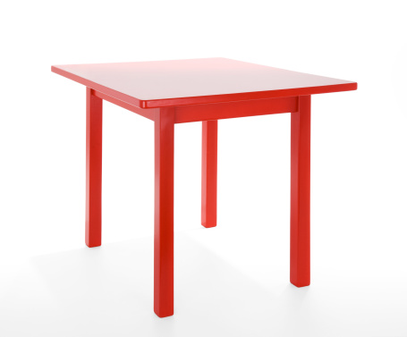 Toddler sized table isolated on a white background.