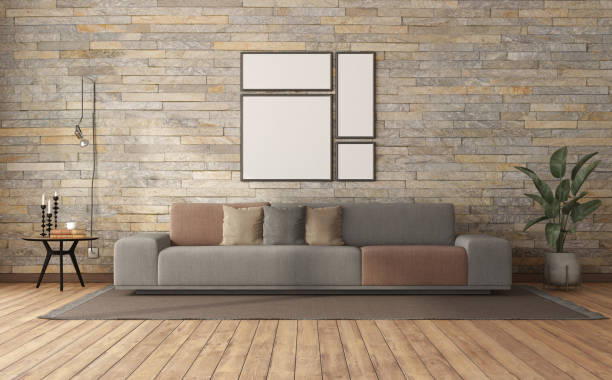 istock Minimalist living room with sofa against stone wall 1353273214