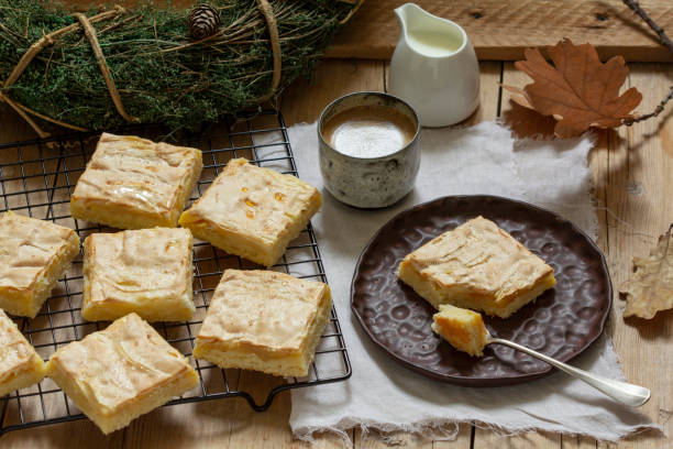 istock Apple pie slices with meringue served with coffee. Rustic style. 1353277306