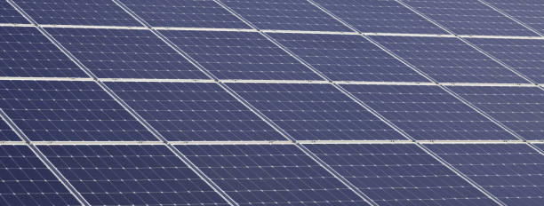 istock Photovoltaic solar panel. Abstract solar panels texture background. 1353281496
