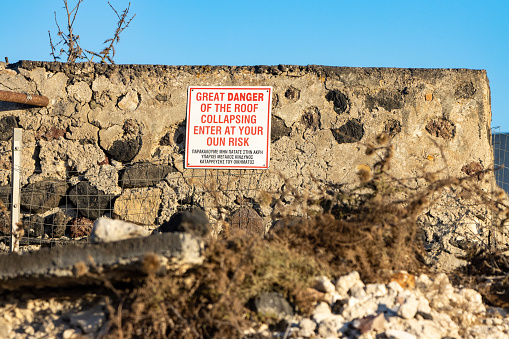Danger Sign at Pyrgos Kallistis on Santorini in South Aegean Islands, Greece