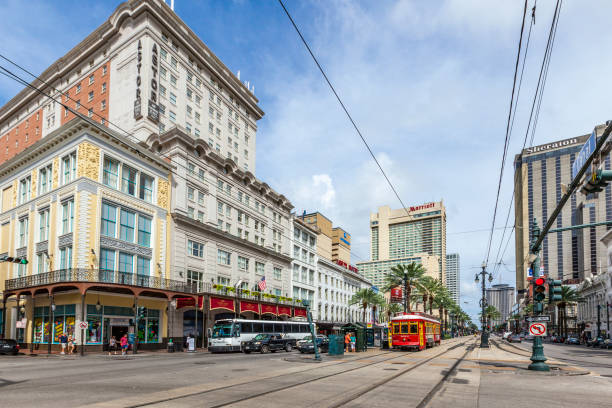 passengers travel with the street car at Canal street downtown New Orleans stock photo