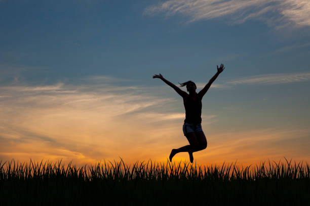 istock Woman enjoying vacation holidays nature 1353289119