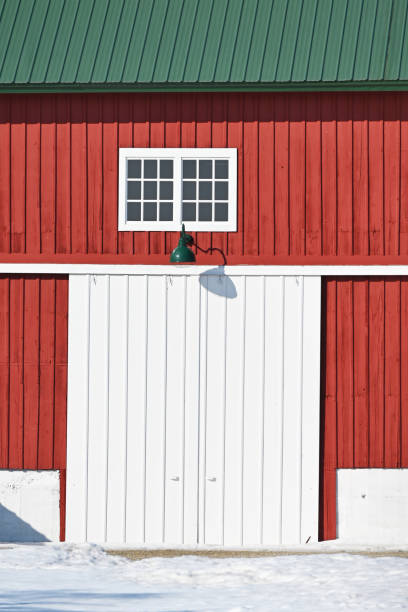 istock White Door on Red Barn 1353289277