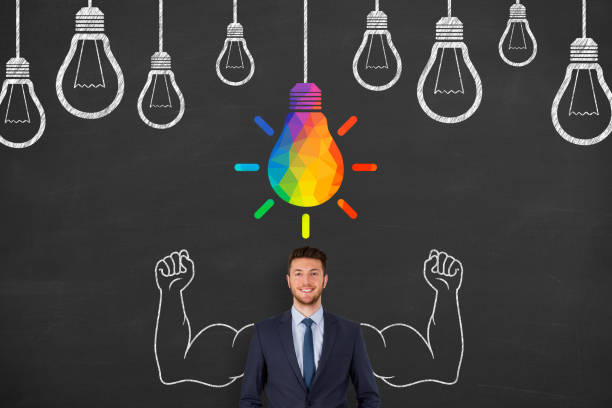 istock Creative idea concepts with light bulbs over human head on a chalkboard background 1353289333