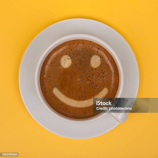 Coffee Cup With Smiley Face On Yellow Background Stock Photo - Download Image Now - Happiness, Change, Positive Emotion