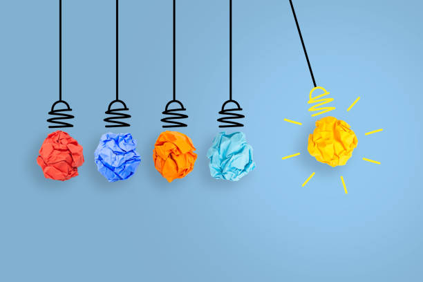 istock Creative Idea Concepts with Light Bulb Crumpled Paper on Blue Background 1353290169