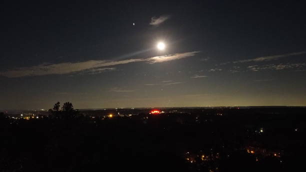 istock Night sky & scene with moon clouds stars space station 1353291510
