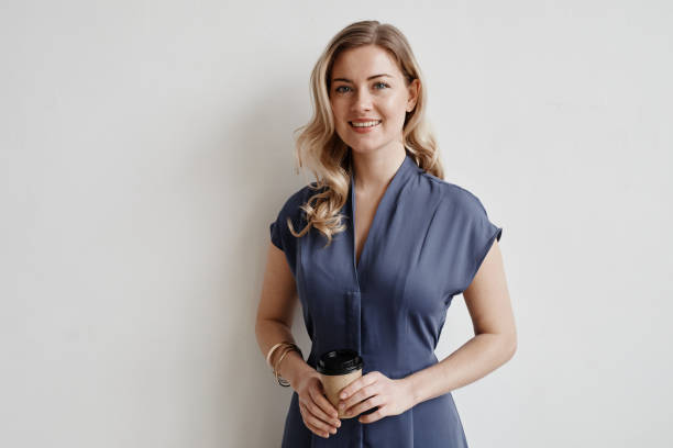 istock Confident Businesswoman on White 1353291838