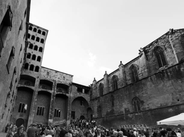 2018 June 6. Spain. Barcelona. An incredible crowd of people in one of the inconspicuous squares of the Gothic quarter of Barcelona. Perhaps these are the Catalans who oppose the policy of the country's authorities.