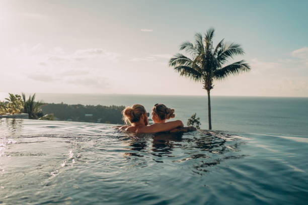 istock Couple enjoying the amazing sea view 1353316412