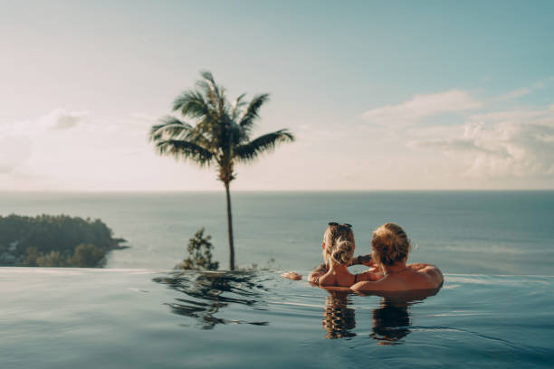 istock Couple enjoying the amazing sea view 1353316414