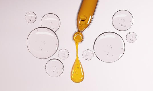 Essence oil mixed in a Cosmetic pipette surrounded by warter bubbles on a white background.-3d rendering.