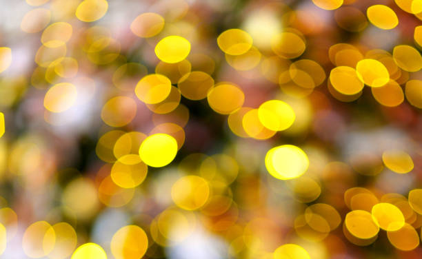 istock Abstract christmas background with golden bokeh 1353343786