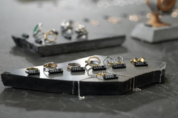istock Marble display with several rings and their pricetags 1353343924