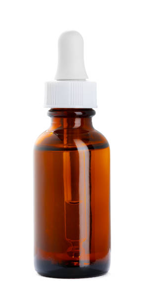istock Brown plastic, glass bottle for cosmetics isolated on white 1353345224