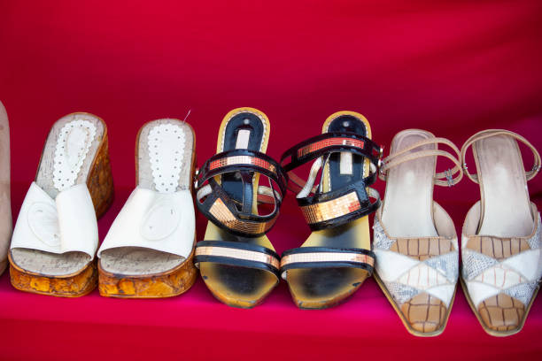 istock Vintage women's shoes on a red background. 1353349066