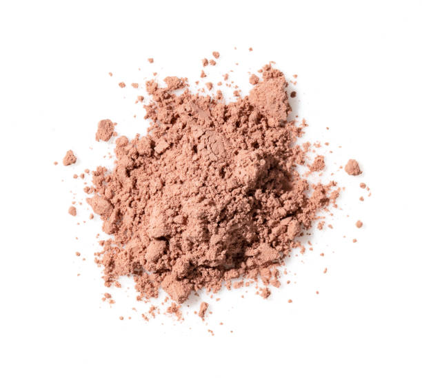 istock Shattered face powder on white background. Concept of makeup foundation 1353349451