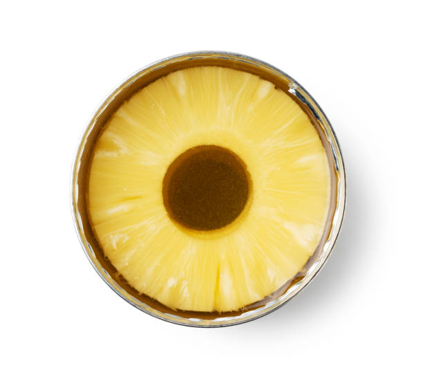 istock An open can of pineapple on a white background. 1353351927