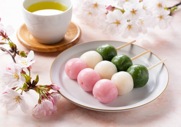 istock Sanshoku dango placed on a pink background. An image of Japanese spring. 1353353129