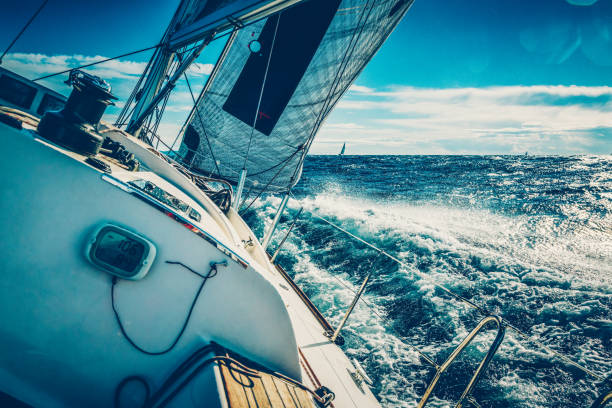 istock Sailboat on regatta on sunny autumn morning 1353354654