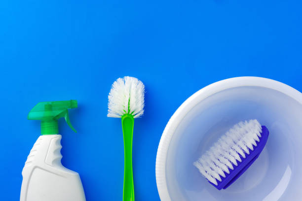 istock House cleaning supplies on blue color background 1353355854
