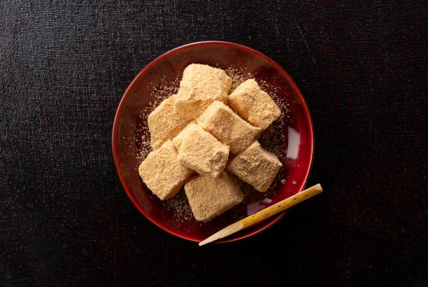 istock Warabi mochi placed on a black Japanese tray. 1353355899