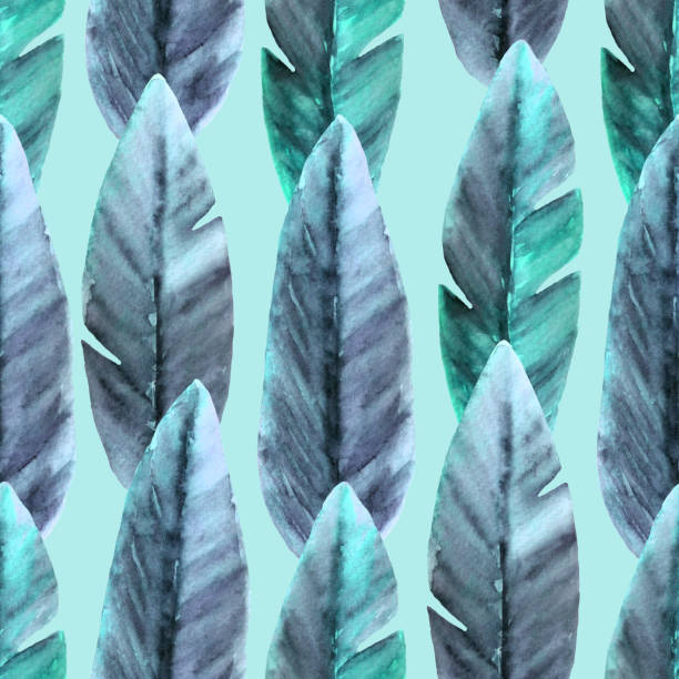 istock Tropical seamless pattern with hand painted watercolor banana leaves. Blue leaves on light background. 1353356556