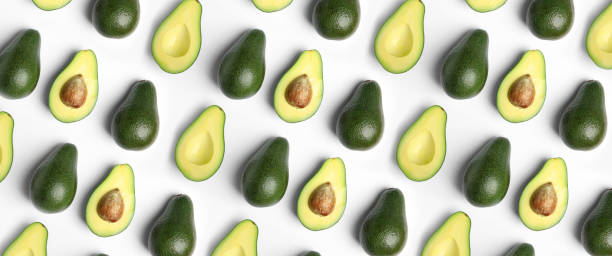 istock Flat lay composition with fresh ripe avocados on white background, banner design 1353358555