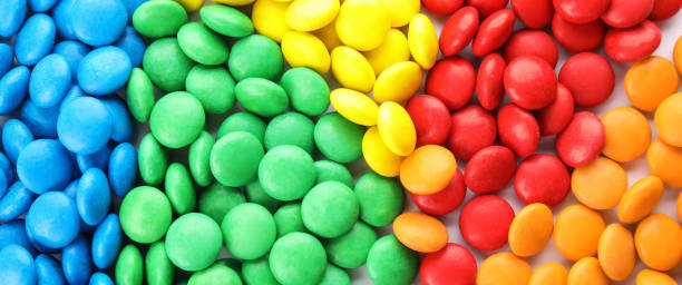 istock Many colorful candies as background, top view. Banner design 1353358617