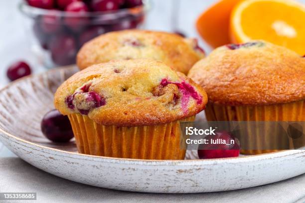 Homemade Cranberry Orange Muffins On Wooden Plate Horizontal Closeup Stock Photo - Download Image Now