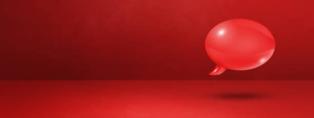 istock Red speech bubble on concrete wall banner background 1353361029