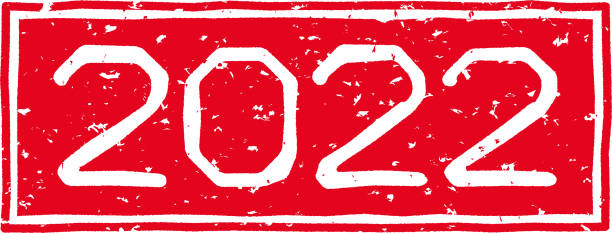 istock Red stamped letters with the number 2022 1353361356