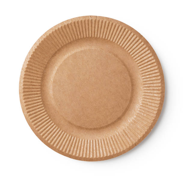 Disposable paper plates on a white background. View from above.