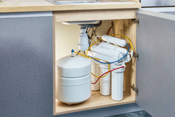 istock Purification osmosis system and water filter at home kitchen. 1353364877