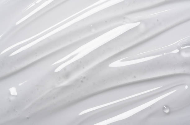 istock Serum texture on transparent liquid gel background. 1353365445