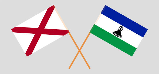 Crossed flags of The State of Alabama and Kingdom of Lesotho. Official colors. Correct proportion Crossed flags of The State of Alabama and Kingdom of Lesotho. Official colors. Correct proportion. Vector illustration alabama football stock illustrations