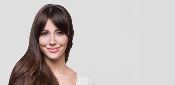 istock Young woman close-up isolated studio portrait 1353369729
