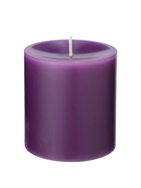 istock A single purple candle on a white background 1353370024