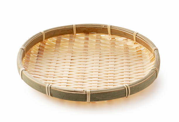 Bamboo basket placed on a white background.Bamboo basket plate for Zaru Soba