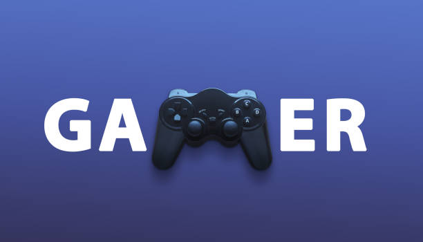 istock Gamer text with joypad in name. Creative gamer concept on purple surface 1353370477