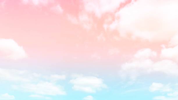 istock Pink sky white clouds. Blue and pink sky white clouds background 1353371091