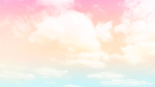 istock Beautiful orange pink sky clouds background 1353371154