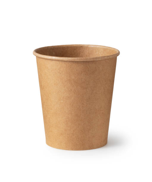 istock Brown disposable paper cups on a white background. The zero-waste concept. 1353371270