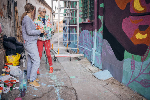 istock Female street artists 1353374377