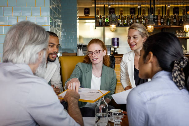 istock Business meeting in a cafeteria 1353377550