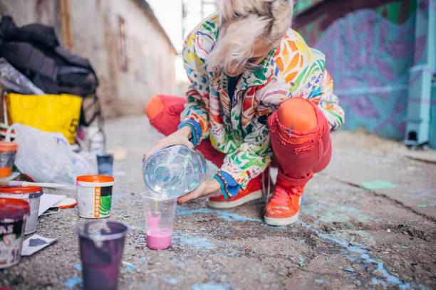 istock Street artist mixing colors 1353377777