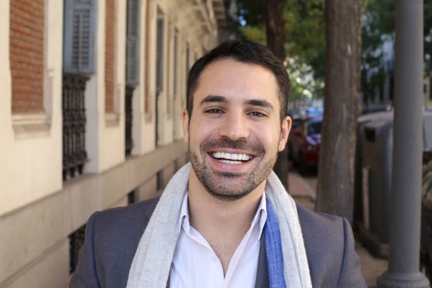 istock Handsome ethnic businessman close up 1353378452